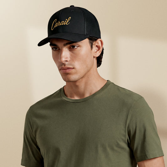 casquette trucker noire brodée carail fil doré portée par un homme style portugais tifoart