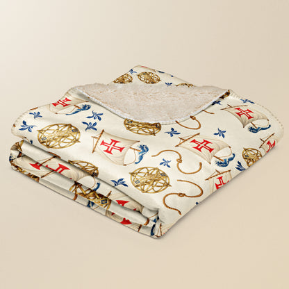 Plaid Descobrimentos plié, croix du Christ et sphères dorées sur fond beige