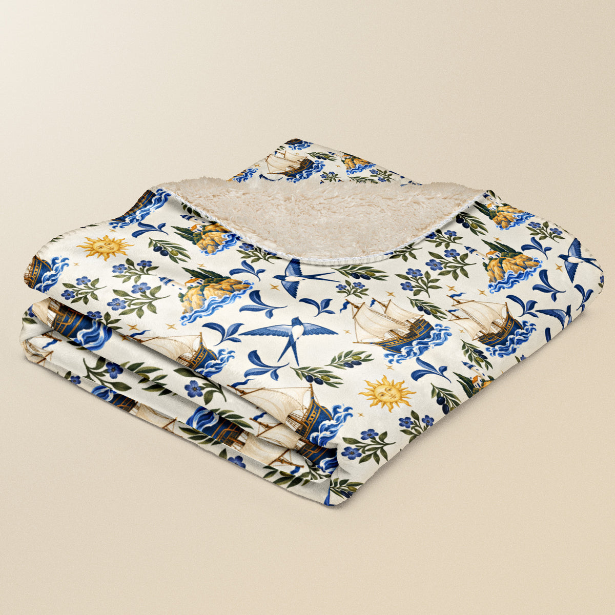 Plaid Caravelas plié, caravelles et soleils sur fond beige