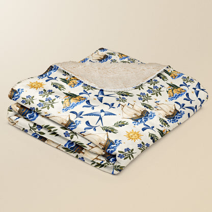 Plaid Caravelas plié, caravelles et soleils sur fond beige