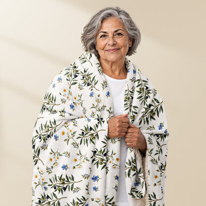 Plaid Oliveira porté sur les épaules, motif olivier portugais