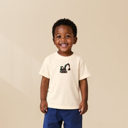 T-shirt enfant crème La Pelleteuse porté par un enfant, série Símbolos Engins TifoArt