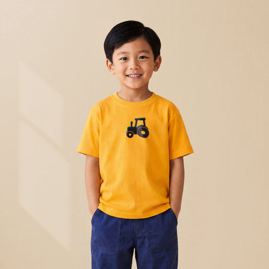 T-shirt enfant Gold Le Tracteur porté par un enfant, série Símbolos Engins TifoArt
